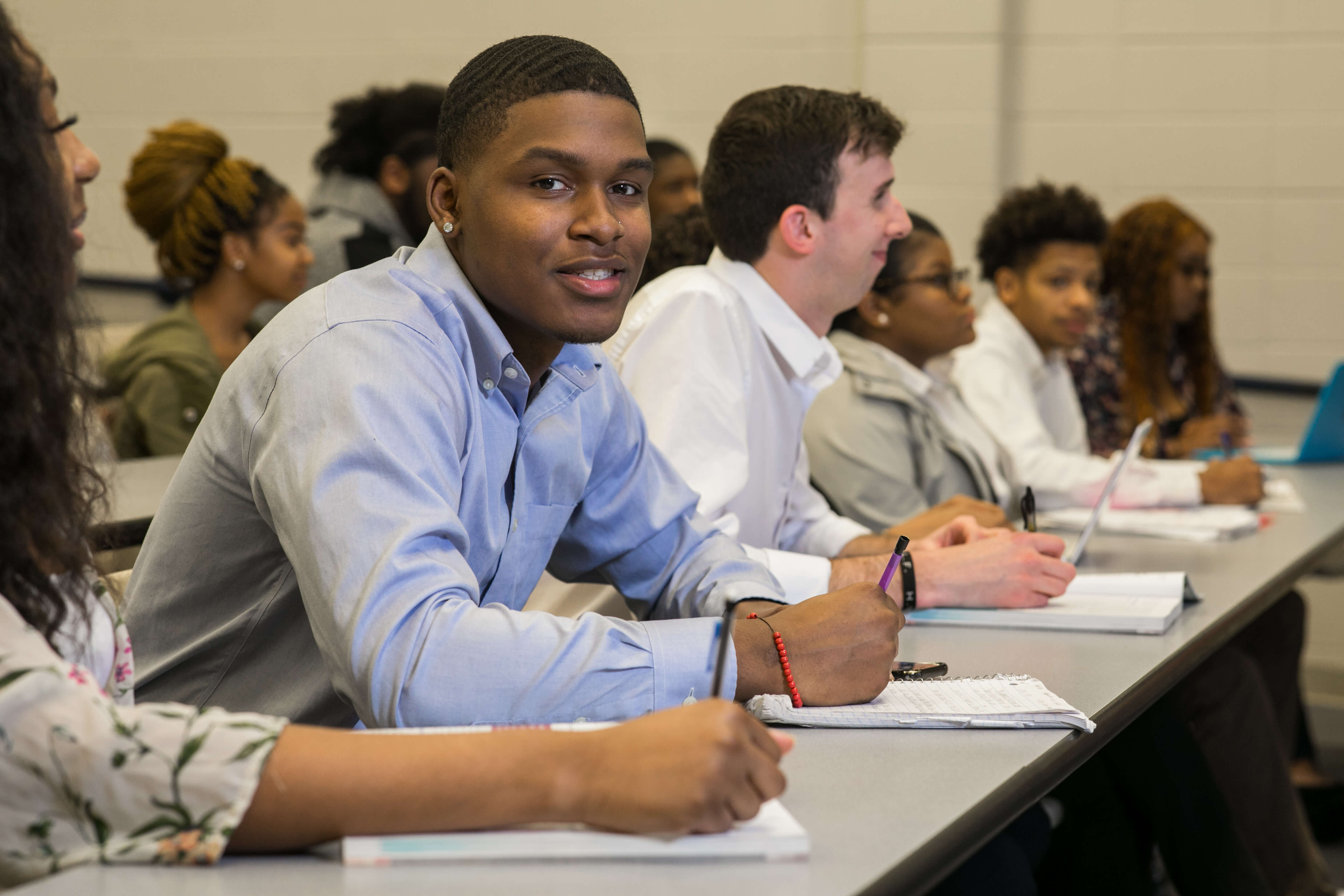 Handsome student smiling